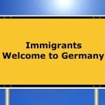 Tabliczka: immigrants Welcome to Germany